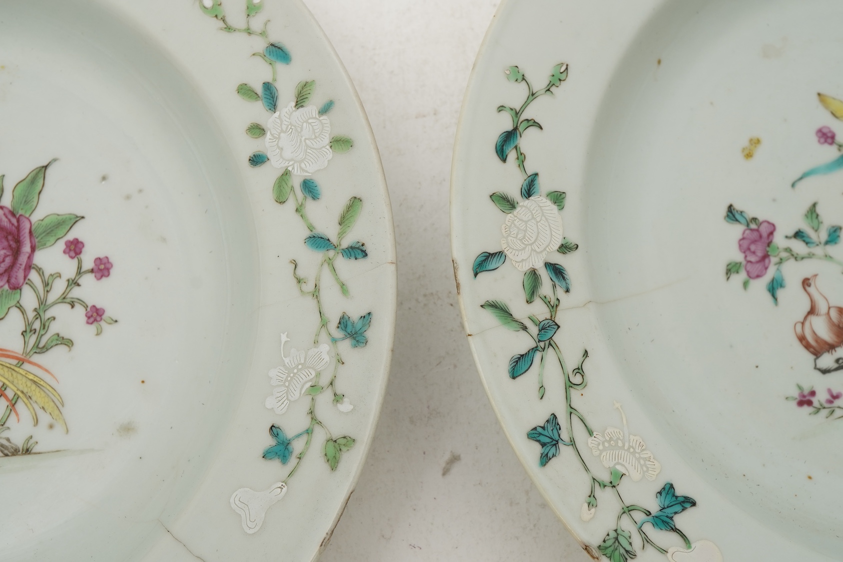 A pair of Chinese famille armorial plates, Qianlong, c.1750